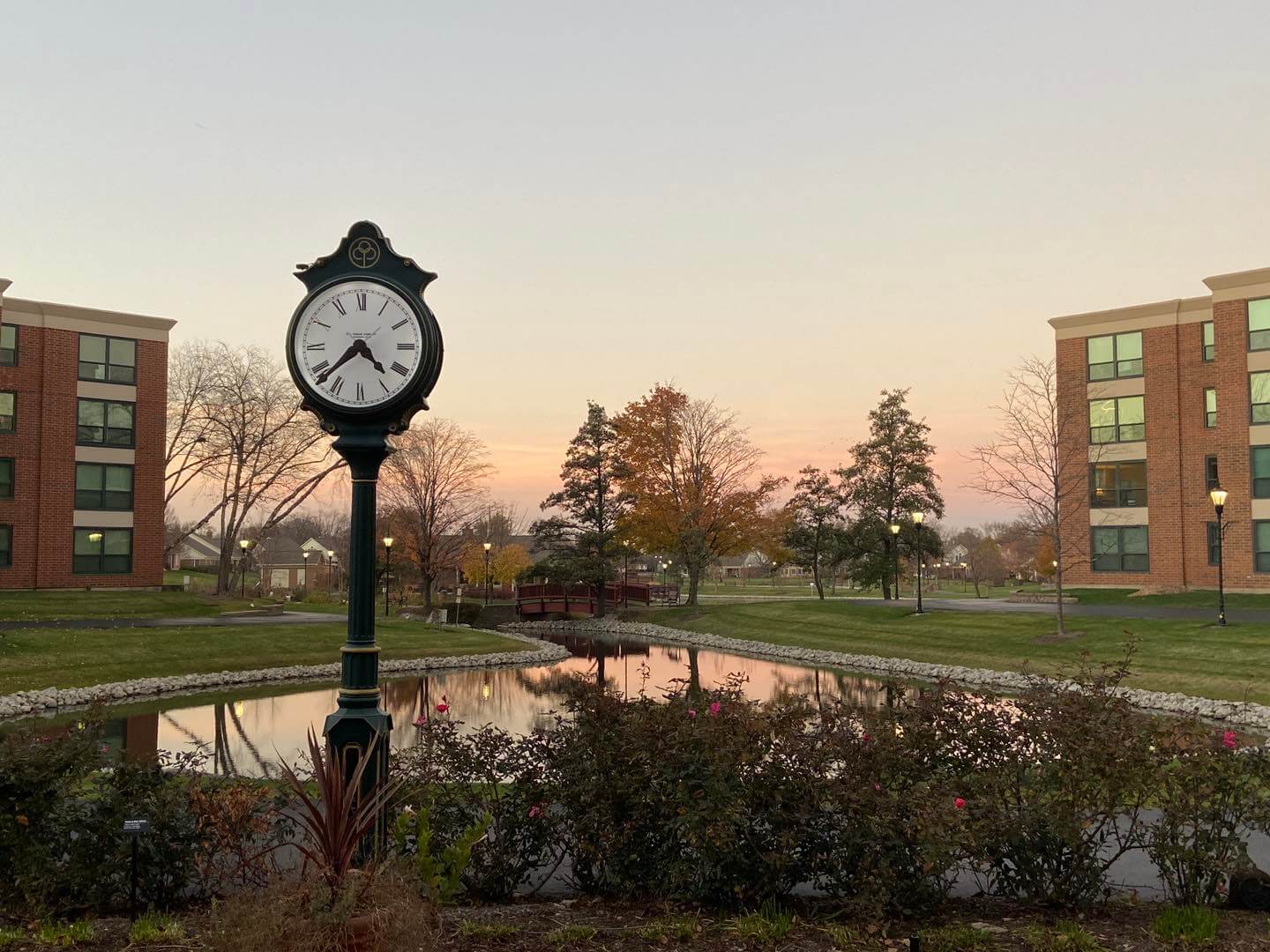 clock on the grounds at nightfall